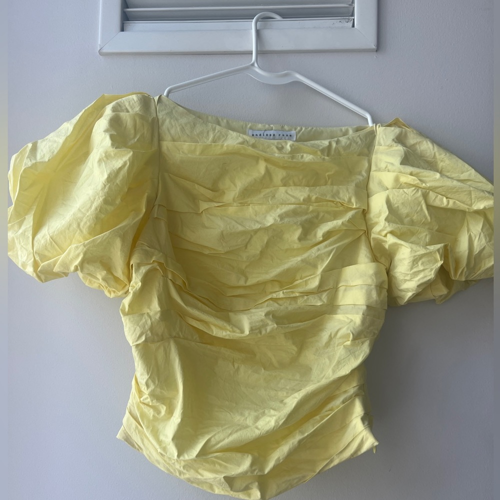 yellow puffy preppy shirt